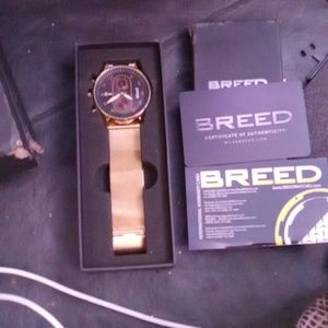 Breed gold watch with Breed gold watch band can be sold in Bezel.Retail $375
